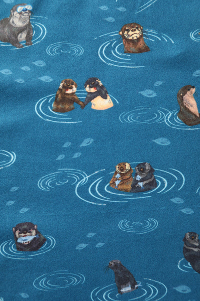   blue otter family print on knit fabric
