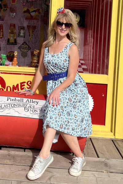 A lady wearing a Blue Striped Flared Dress in Nautical Print