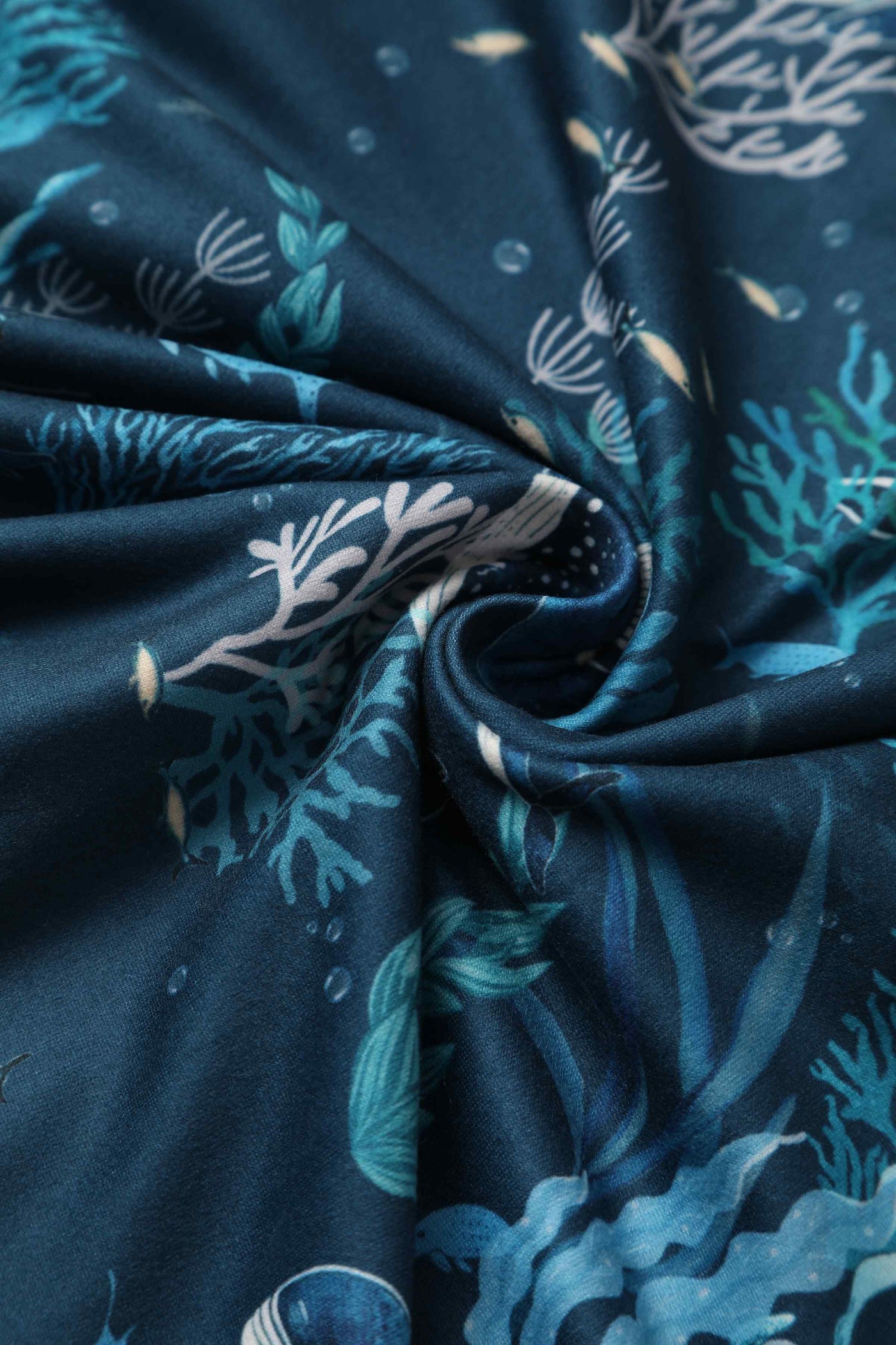 Close up view of blue whale print sleeved swing dress in blue