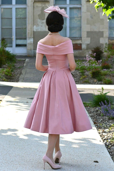 Back view of a woman wearing a Blush Pink Off Shoulder Dress