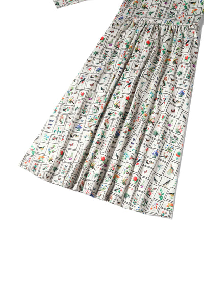 Close up view of Botanical and Bird  Print Flared Dress in Cream