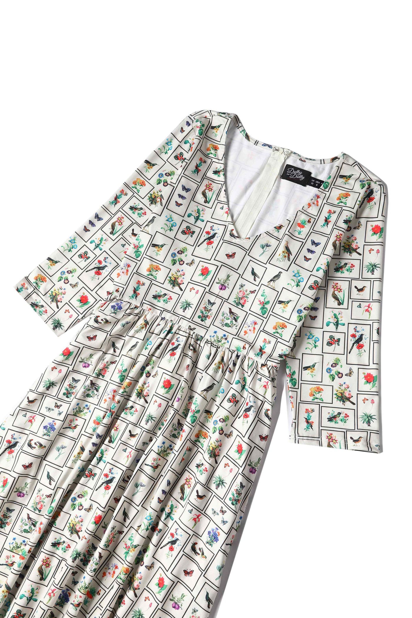 Close up view of Botanical and Bird  Print Flared Dress in Cream