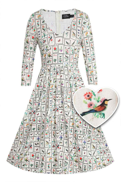 Front view of Botanical and Bird Print Flared Dress in Cream