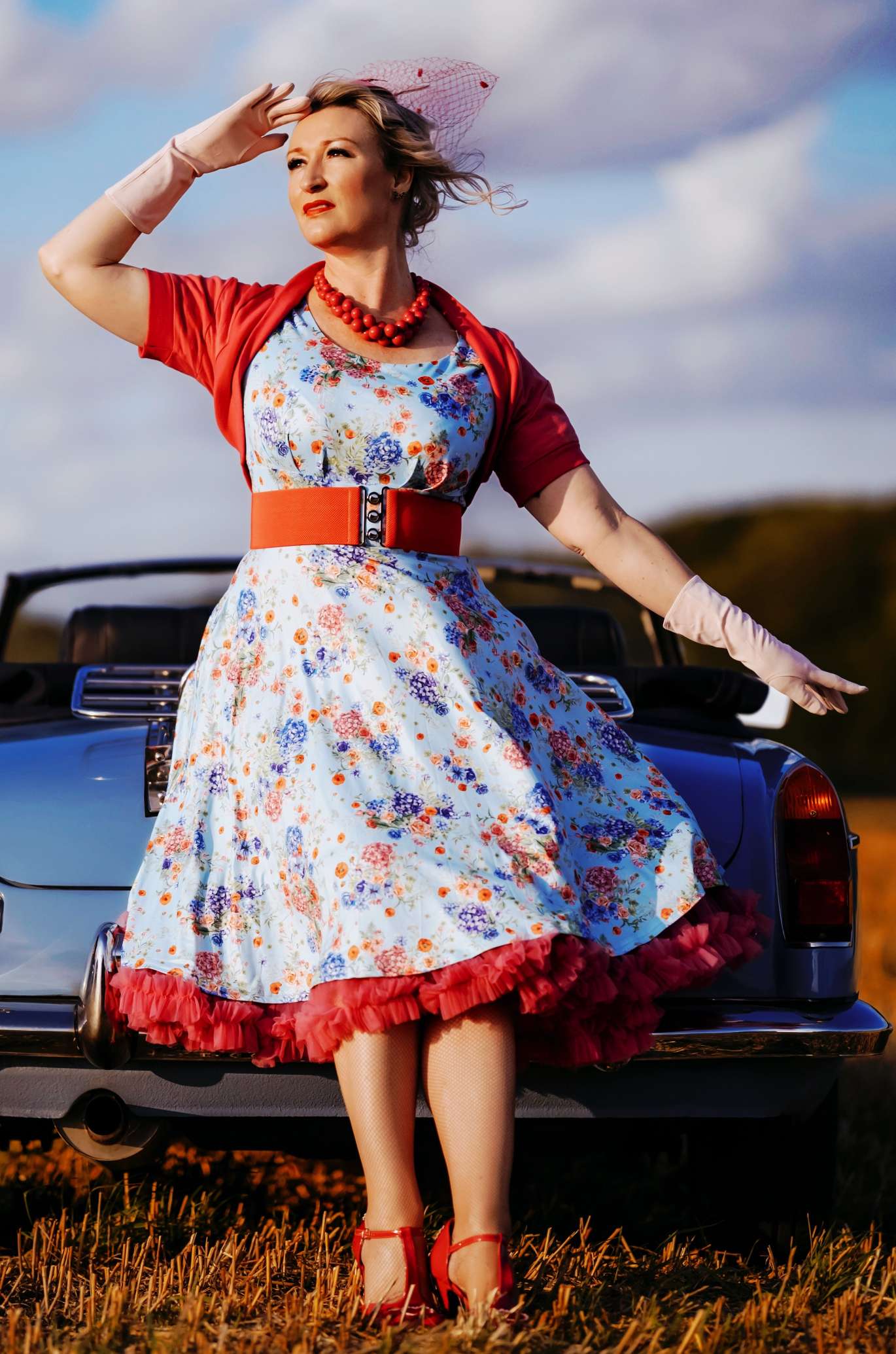 A model wearing a Brenda Light Blue Hydrangea Dress