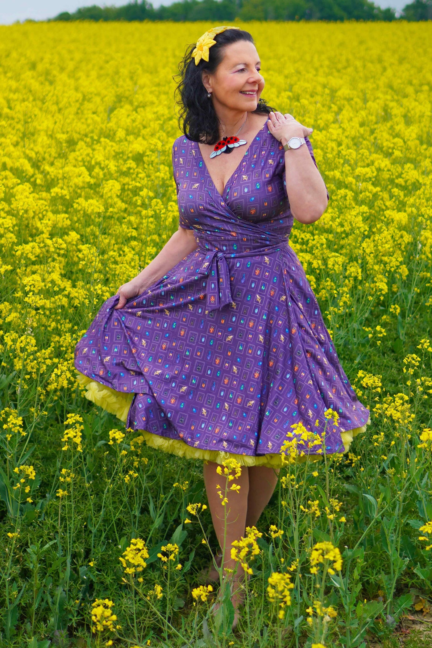 A model wearing Bug Collection Wrap Dress