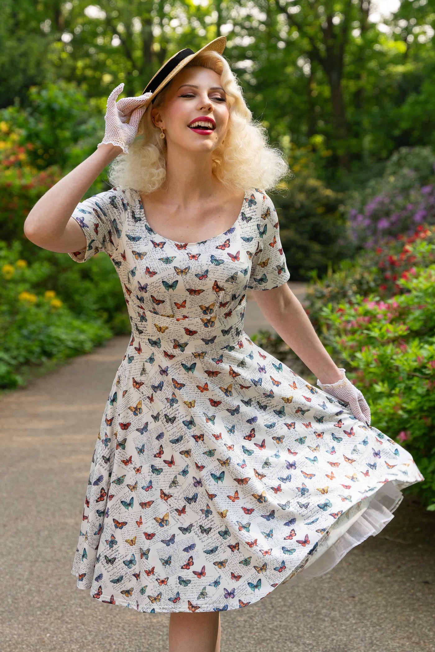 Model photo of White Butterfly Collection 50s Style Dress