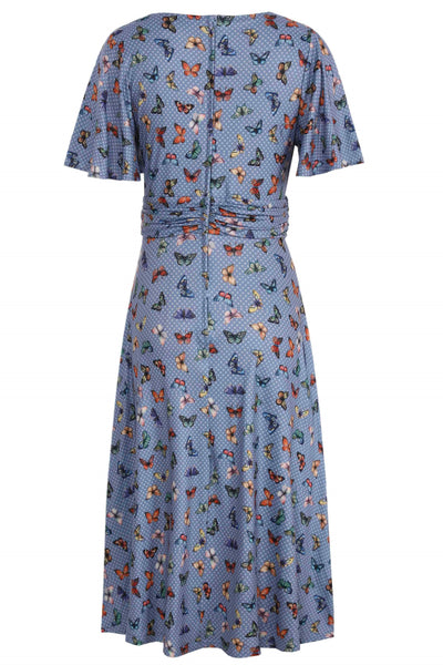 Back view of Butterfly Polka Dot Tea Dress in blue