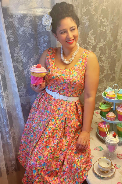 A lady wearing a Candyland Swing Dress