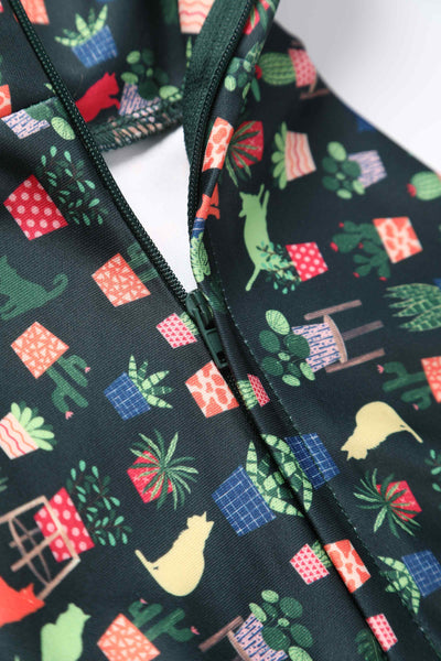Close up view of Cat & Plant Dress In Dark Green