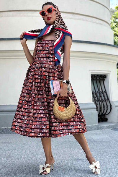 A model wearing an Amanda Cat and Book Swing Dress
