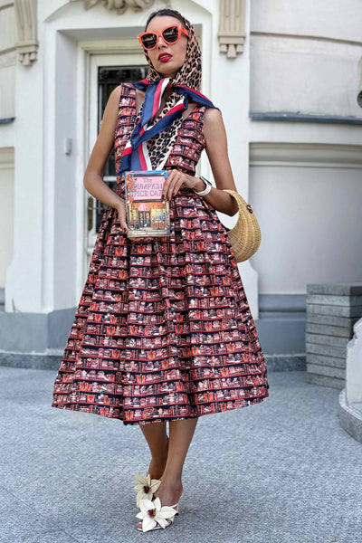 A lovely model wearing an Amanda Cat and Book Swing Dress