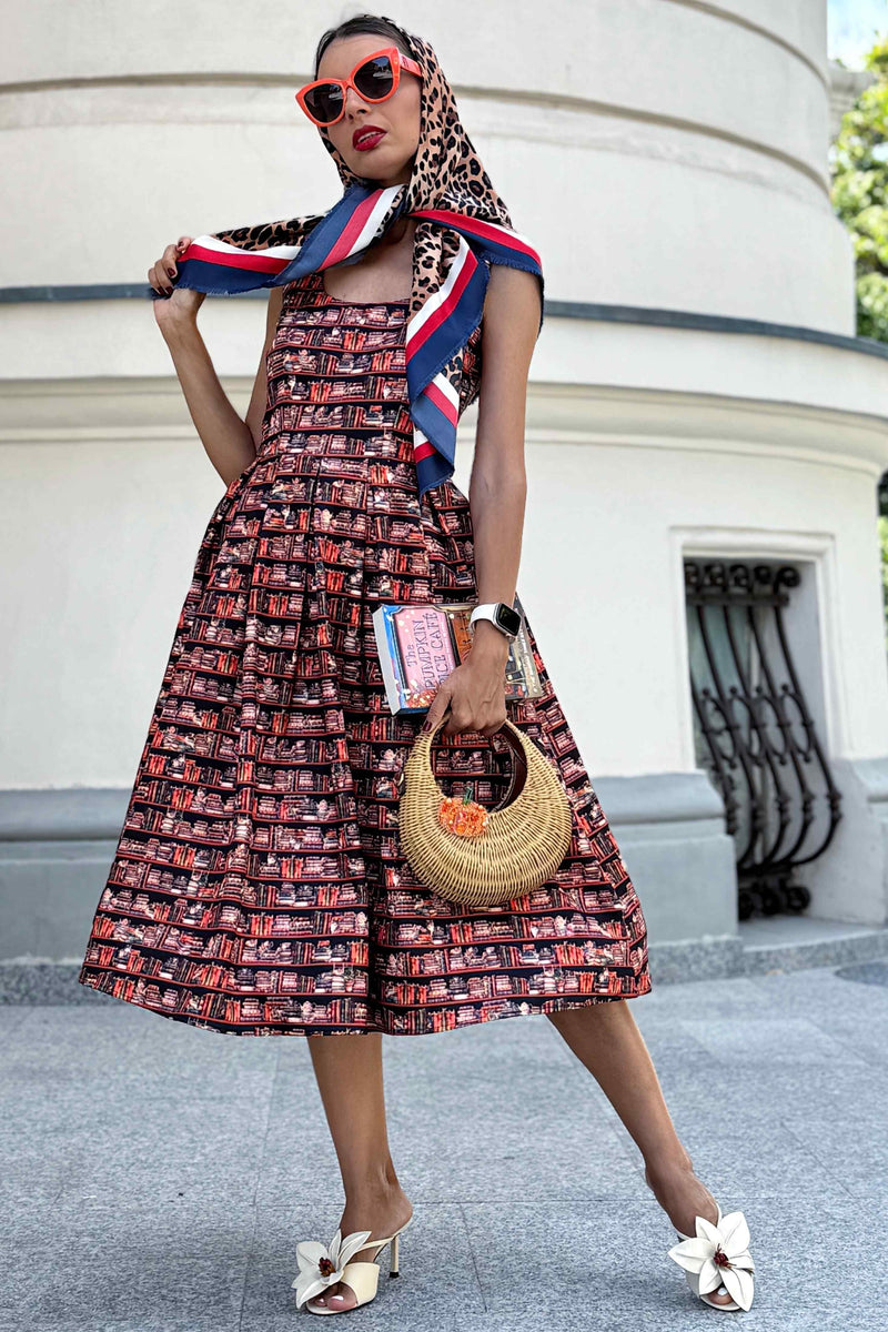 A model wearing an Amanda Cat and Book Swing Dress