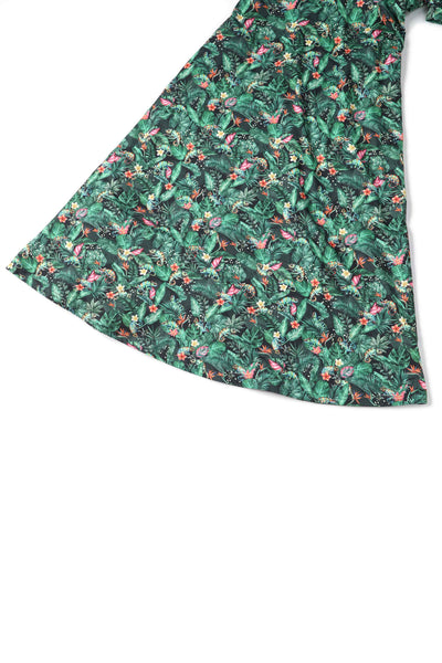 Close up view of Chameleon Midi Dress In Green
