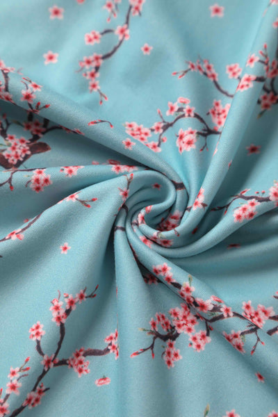 Close up View of Cherry Blossom Tea Dress in Blue