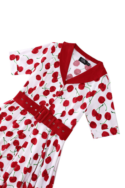 Close up view of Mollie Cherry Full Circle Shirt Dress In White