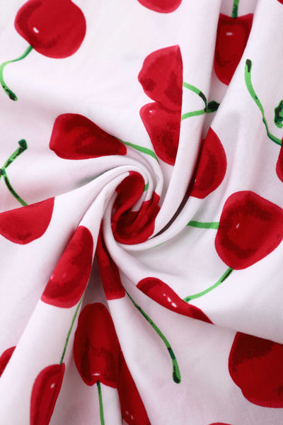 Close up view of Mollie Cherry Full Circle Shirt Dress In White