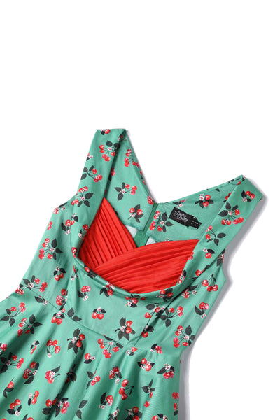 Close up View of Cherry Pleated Bust Dress in Emerald Green