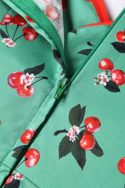Close up View of Cherry Pleated Bust Dress in Emerald Green