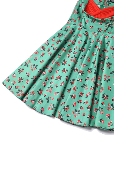 Close up View of Cherry Pleated Bust Dress in Emerald Green