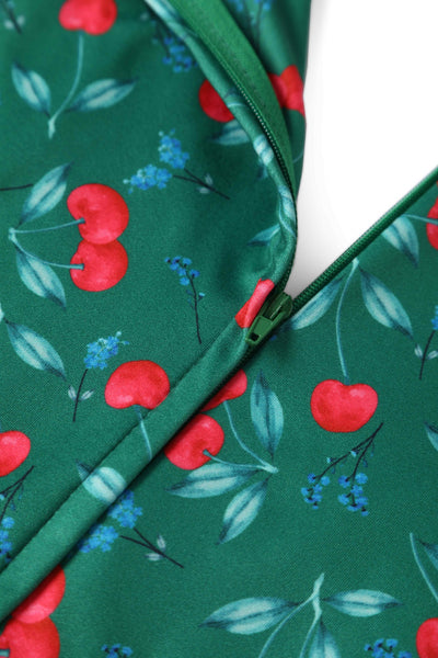Close up View of Cherry Print Jumpsuit in Emerald Green