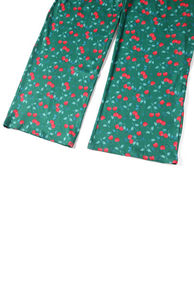 Close up View of Cherry Print Jumpsuit in Emerald Green