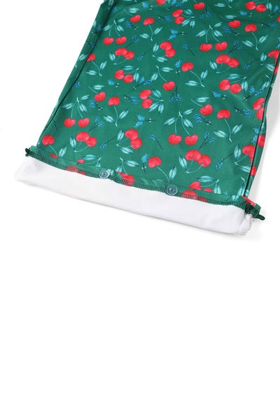 Close up View of Cherry Print Jumpsuit in Emerald Green
