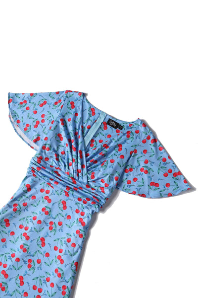 Close up view of Cherry Print Summer Tea Dress in Blue