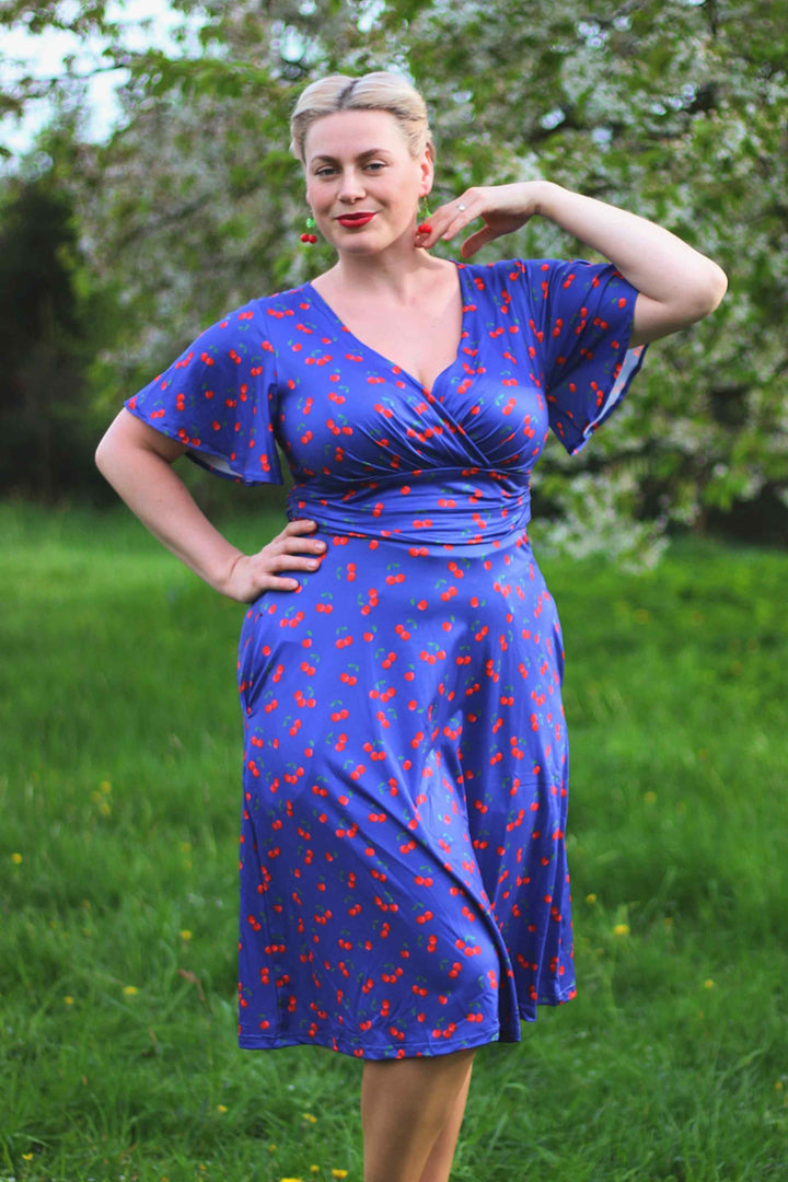 navy blue dress with cherries Navy and Cherry Bishop Sleeve Wiggle Dress by Unique Vintage
