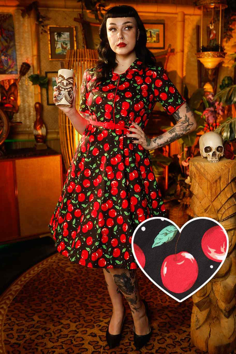 A model wearing cherry shirt dress