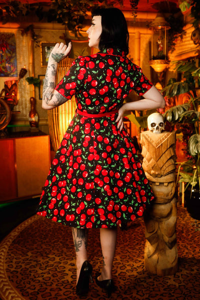 A model wearing a Cherry Shirt Dress