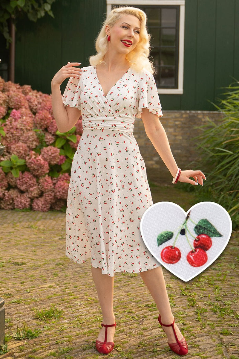 A model wearing a Cherry White Crossover Bust Dress