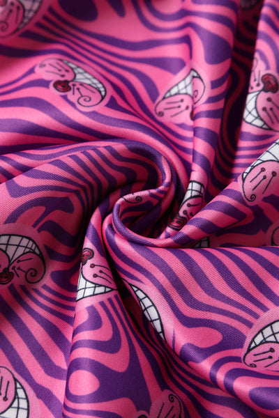 Close up view of Cheshire Cat Print Swing Dress in Pink