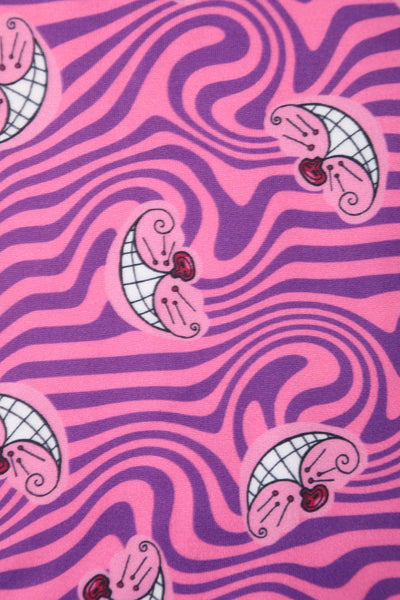 Close up view of Cheshire Cat Print Swing Dress in Pink