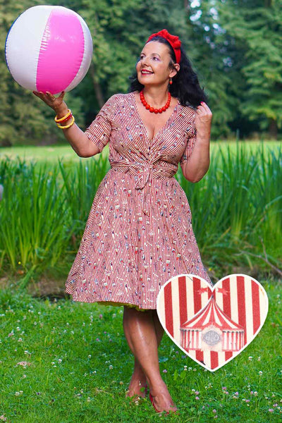 A model wearing a Circus Red Striped Wrap Dress