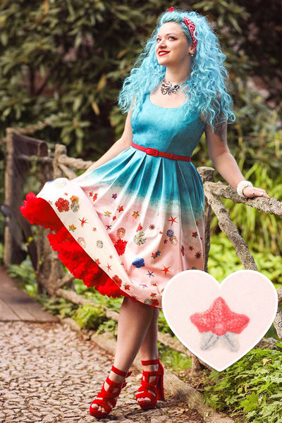 A lovely lady wearing Coastal Crush Swing Dress