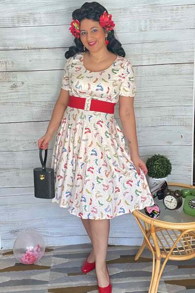 A lady wearing a Stiletto White Short Sleeved Dress
