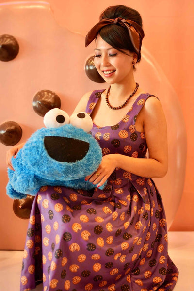 Model photo of Purple Retro Flared Dress in Cookie Print
