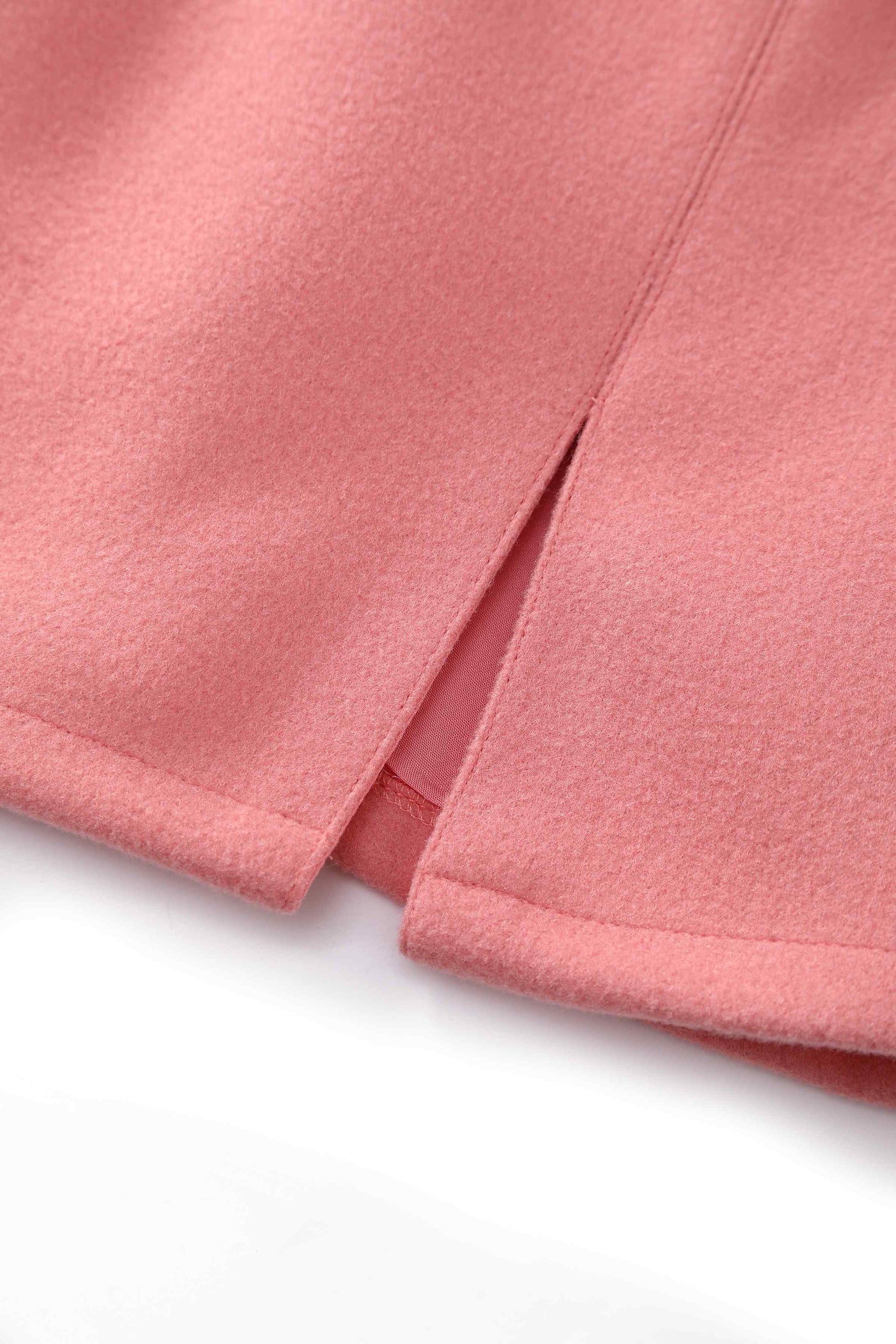 Close up view of Coral Pink Cape Jacket