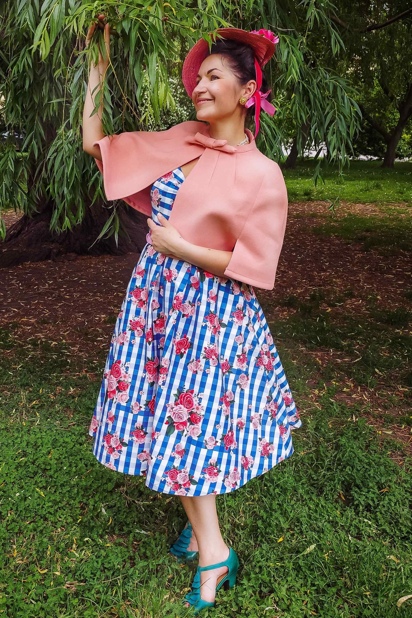 A model wearing Coral Pink Cape Jacket