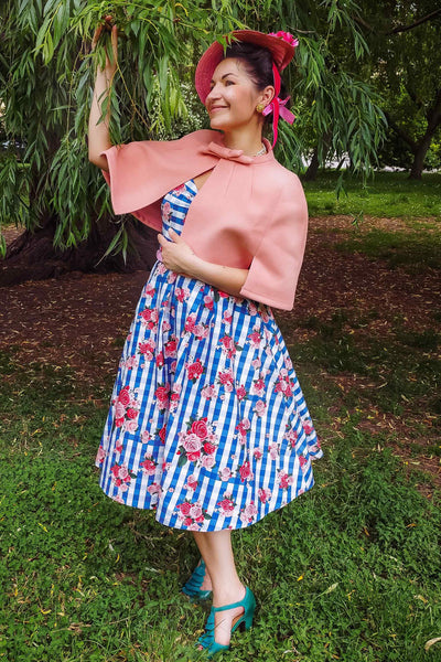 A model wearing Coral Pink Cape Jacket