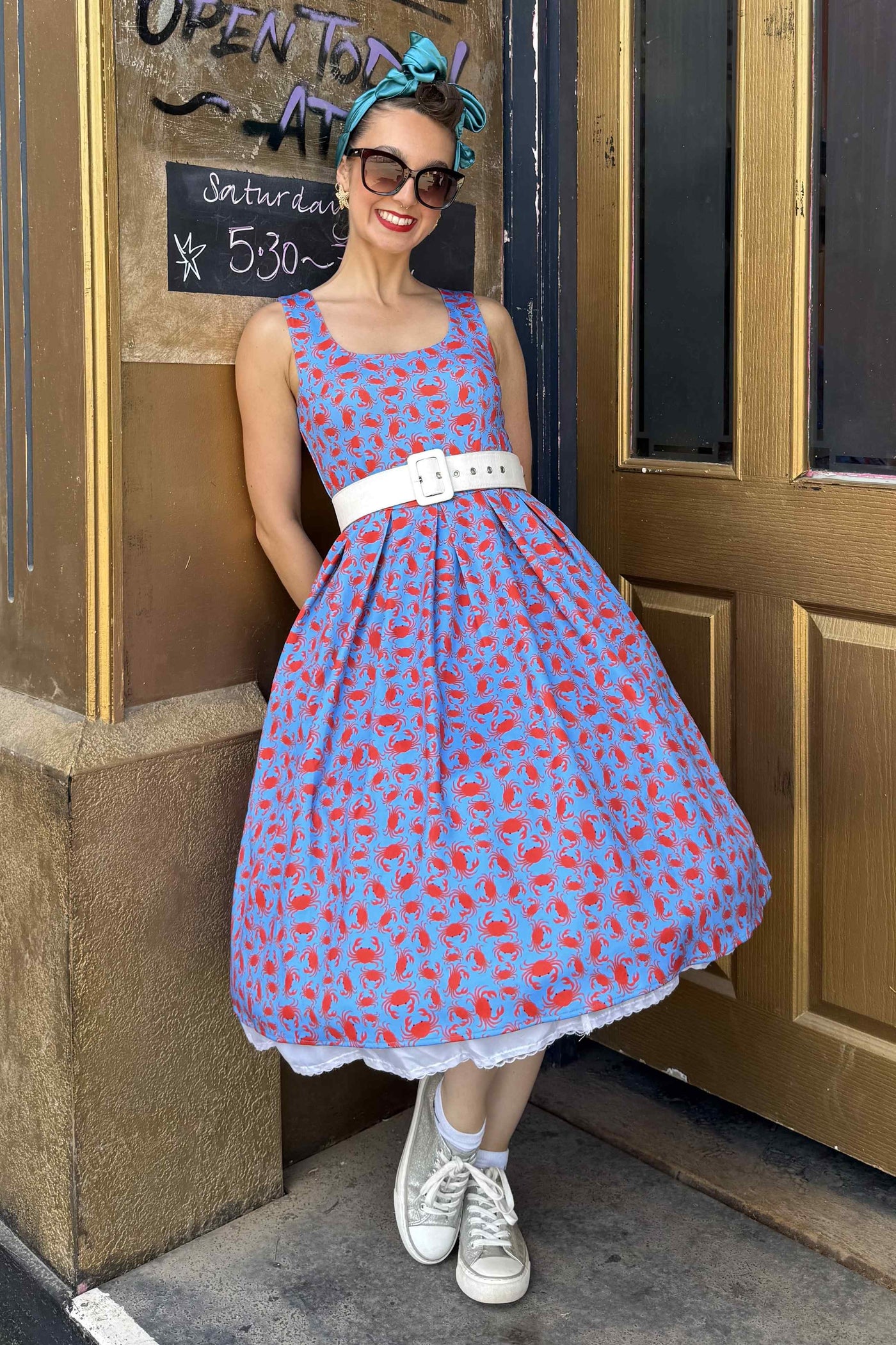 A woman wearing a Crab Print Swing Dress