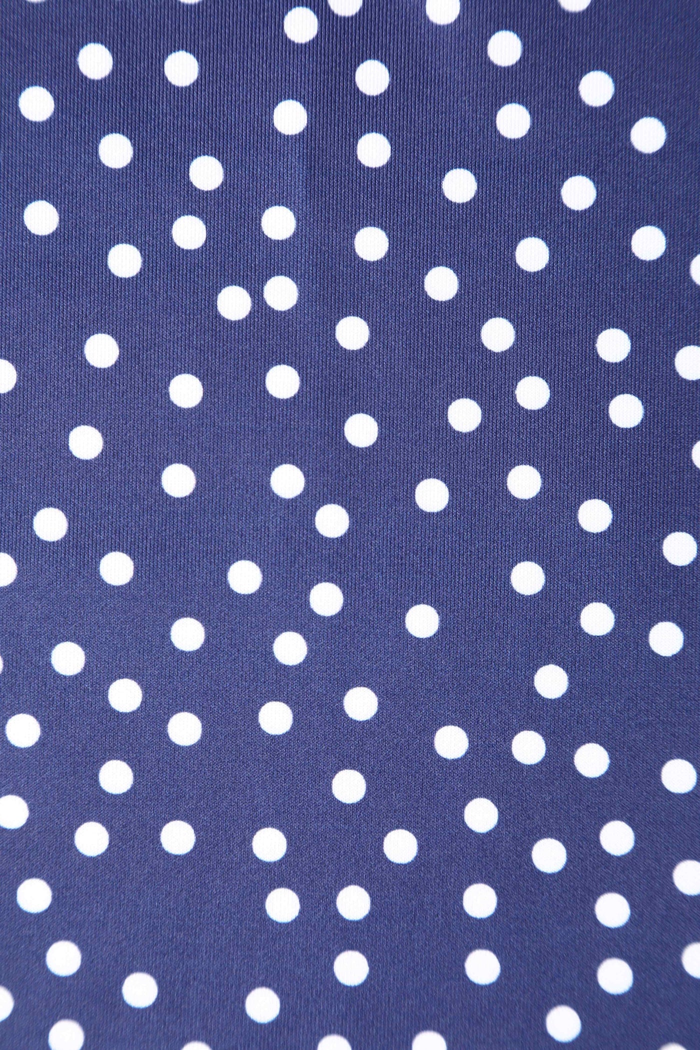 Close up view of Cross Strap Fitted Dress in Blue Polka Dots