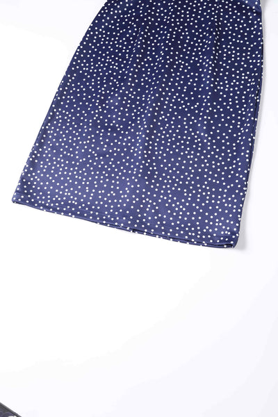 Close up view of Cross Strap Fitted Dress in Blue Polka Dots