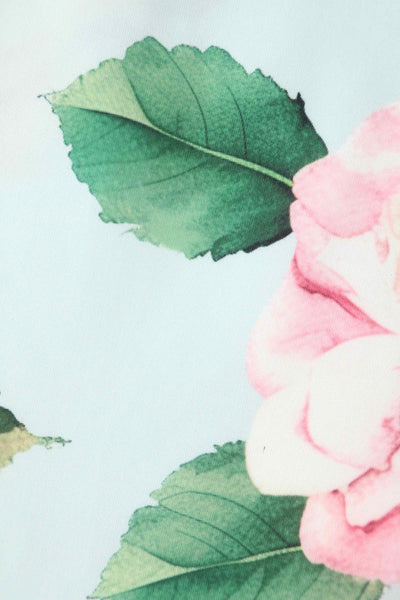 Close up view of Crossover Bust Baby Blue Rose Dress