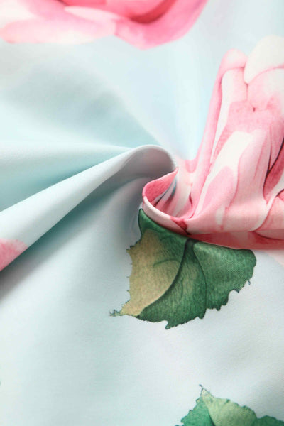 Close up view of Crossover Bust Baby Blue Rose Dress