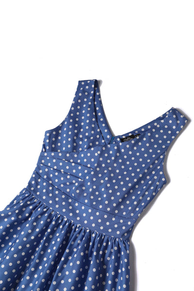 Close up view of Crossover Bust Blue and White Polka Dot Dress
