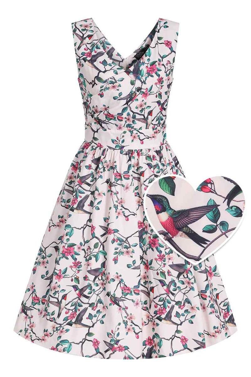 Front view of Crossover Bust Circle Dress In White Bird Print