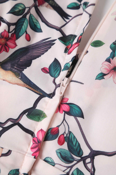 Close up view of Crossover Bust Circle Dress In White Bird Print