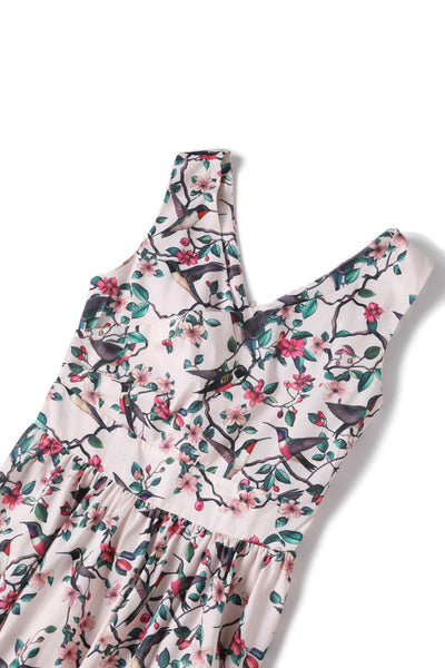 Close up view of Crossover Bust Circle Dress In White Bird Print