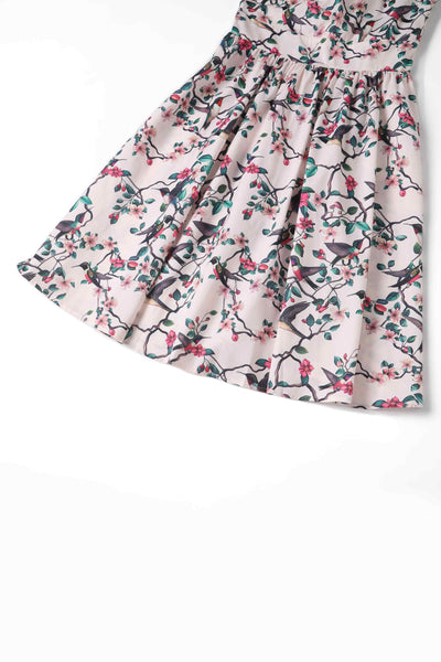 Close up view of Crossover Bust Circle Dress In White Bird Print